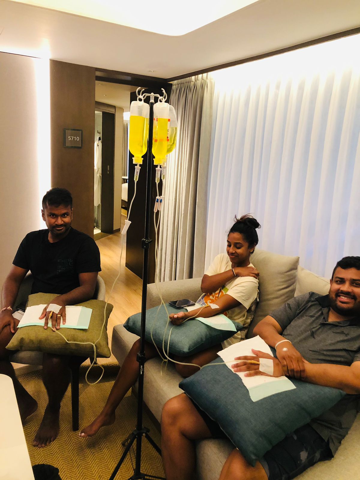 Client receiving mobile IV drip at a Sanur Bali hotel